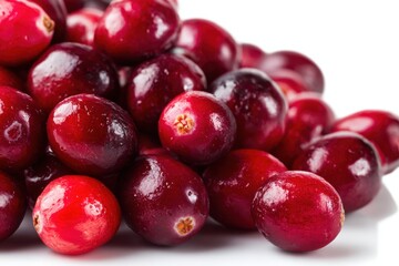 Red Cranberry Fruit Background. Cranberries. Full depth of field. Heap of raw fresh cranberries on a white isolated background. Vegetarian food and fruits high in antioxidants conceptual idea