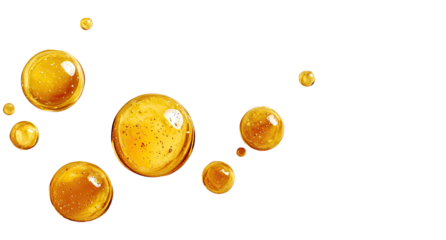 Golden oil droplets floating in air