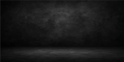 Vintage black blank chalkboard on a dark gray aged concrete wall, a textured grunge background for your design