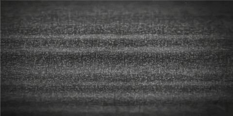 An aged black leather and gray fabric texture with a rough canvas pattern