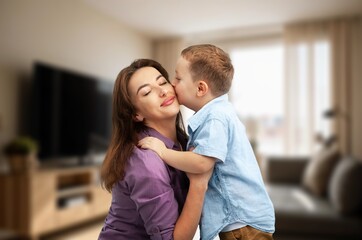 Fototapeta premium Grateful mother embrace little child greeting Women Day