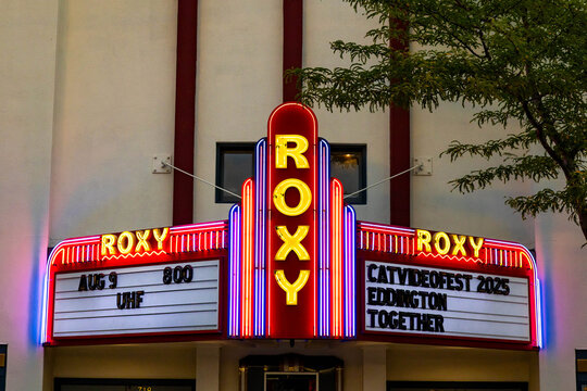 Famous historic Roxy theater illuminated at dusk in Missoula