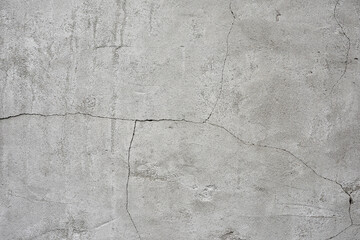 Fototapeta premium surface wall concrete for background. Abstract of surface wall concrete for vintage background. Wall texture for background. old cracked plaster, grey cement floor, needs repair, restoration