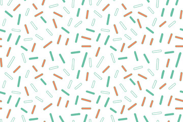 Seamless colorful sprinkles pattern on a white background, ideal for festive designs, sweet food themes, and playful celebrations.