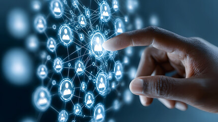 Hand touching a digital network of people representing online communication
