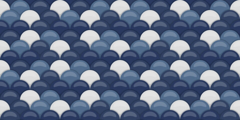 Seamless pattern of overlapping scales in shades of navy and white.  Elegant, modern design perfect for website backgrounds, textile prints, or decorative projects. © Olena