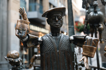 Close-up of bronze statue figure in Brussels city street