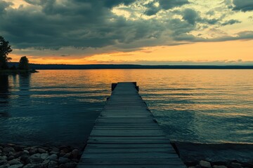 Obraz premium Serene Sunset over Torch Lake: A Tranquil Dock Retreat in Northern Michigan
