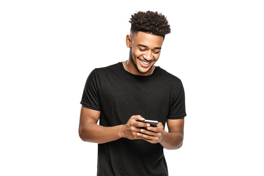African-American man in black tee smiles and uses a phone. Isolated cutout for social media, website design, or poster.