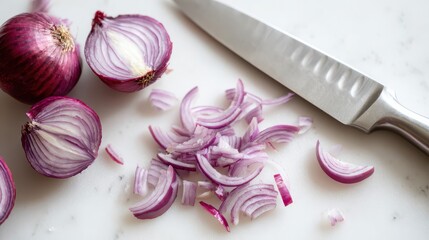 Chef chopping fresh red onions on marble cutting board