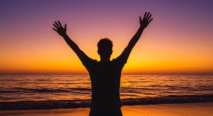 Fototapeta premium Silhouette of Man at Sunset Beach, Arms Raised in Peaceful Celebration, Warm Golden Hour Light