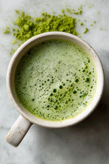 A Matcha Latte on a White Marble Surface 