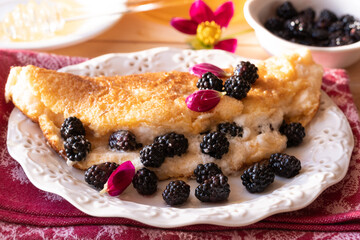 Omelette with blackberries