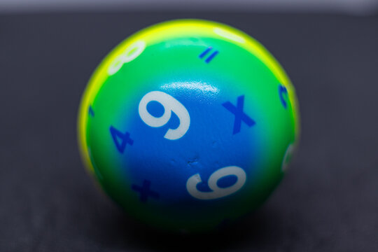 Vibrant Rainbow Learning Ball Featuring Numbers and Math Signs.