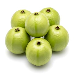 A group of fresh whole green tropical guava fruits isolated on a white background.