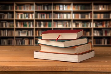 open book on a wooden table, in library