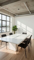Modern conference room with white table, black chairs, large windows, and indoor plant in bright natural light