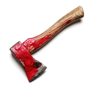 Rustic wood handled axe with red paint for halloween theme on white background