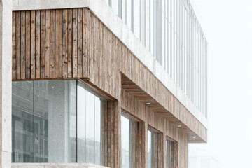 modern wooden building facades in closeup detail highlight contrast between wood and glass elements