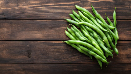 Many raw green beans on wooden table, flat lay