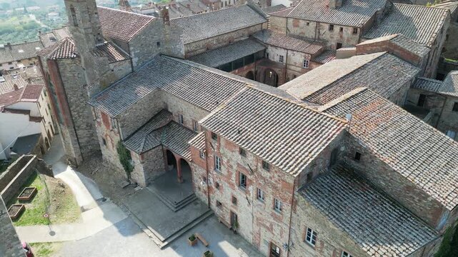 Drone reveals Lucignano valley with pigeons flying