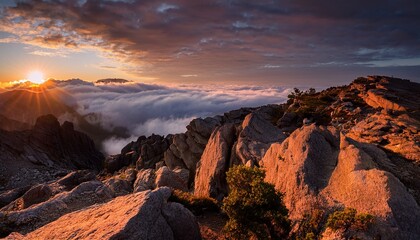 Fototapeta premium this dramatic image showcases rugged rocky terrain illuminated by the first light of dawn with clouds dispersing evoking a sense of adventure and the untamed beauty of nature