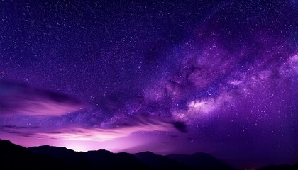 Fototapeta premium a deep purple sky with a few stars and clouds