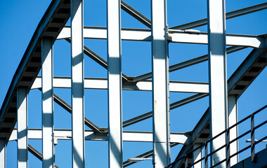 The Meernbrug in Utrecht captured from below, where white steel beams form a striking square-like pattern against the vivid blue sky © Leon Hellegers