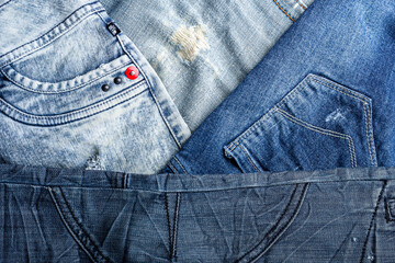 Detail close up of 3 different types of blue denim jeans