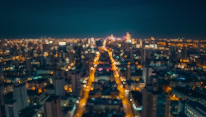 Fototapeta premium Nighttime city avenue stretching from rooftop, with streetlights, lit windows, distant towers