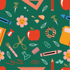 Seamless pattern of flat back to school elements and supplies on a green background.Vector illustration.
