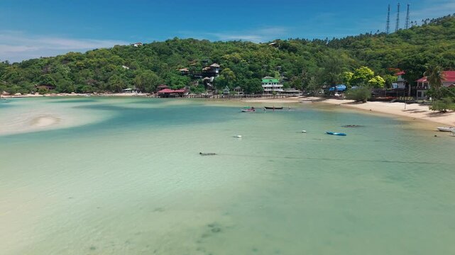  Chalok Baan Kao, Koh Tao, Thailand Aerial drone flyover beach and jungle, sand blue turquoise water.