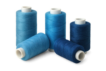 Four blue sewing threads lying on transparent background