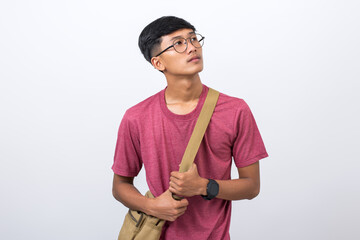 Portrait of young student thinking ideas with hand on head isolated on white background.