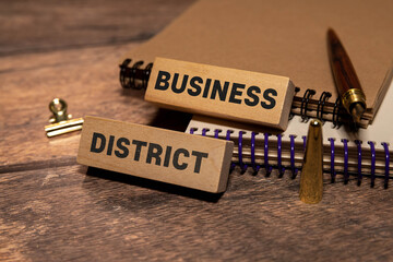 wooden blocks with the inscriptions BUSINESS DISTRICT
