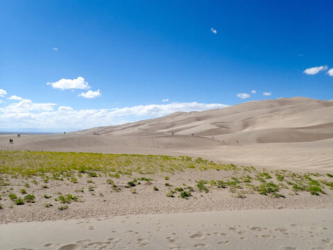 Visitors Exploring the Dunes at Great Sand Dunes National Park
