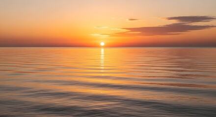 Fototapeta premium Serene ocean horizon at sunset with warm golden light reflecting on rippling water and soft clouds