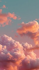 Fluffy pink clouds float in a serene light blue and pink sky at sunset