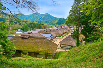 新緑の福島県南会津郡下郷町 茅葺屋根の大内宿(おおうちじゅく)の風景