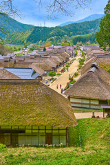 新緑の福島県南会津郡下郷町 茅葺屋根の大内宿(おおうちじゅく)の眺望(高倉山など)