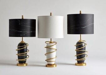 Three modern table lamps, black and white marble-patterned shades, gold-toned bases with spiral designs