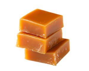 Three caramel candies stacked on top of each other isolated on transparent background.