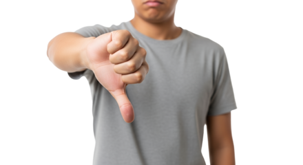 Person expressing negativity through thumbs down gesture against a bright background portraying discontent or disapproval, and the power of