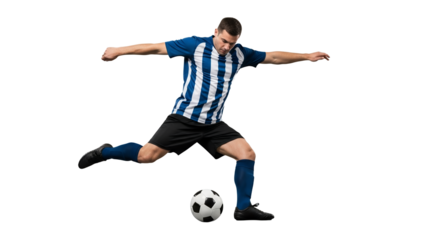 Dynamic soccer player in blue and white uniform prepares to kick the ball with determined focus and outstretched arms demonstrating athletic prowess
