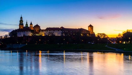 Castle silhouette at sunset over river