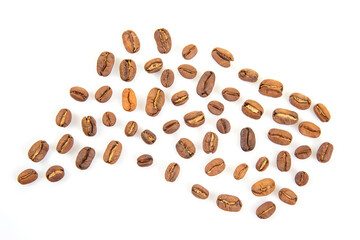 Coffee beans scattered in an artistic arrangement on a white background