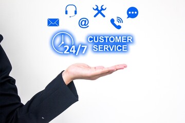 Twenty four seven customer service for business support, communication, and assistance. Useful for illustrating a system for handling questions and inquiries.