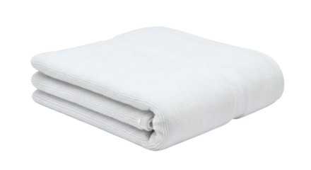 Neatly folded pristine white cotton towel on a solid black background, perfect for bathroom or spa visuals
