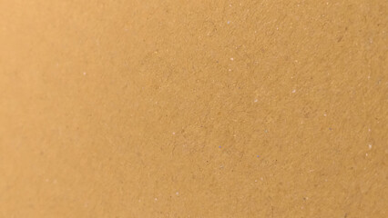 Background of brown kraft paper or cardboard texture. Beige surface background texture light rough textured spotted blank.