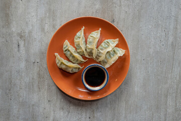 Delectable Dumplings: An overhead shot showcases a delectable array of freshly cooked dumplings...